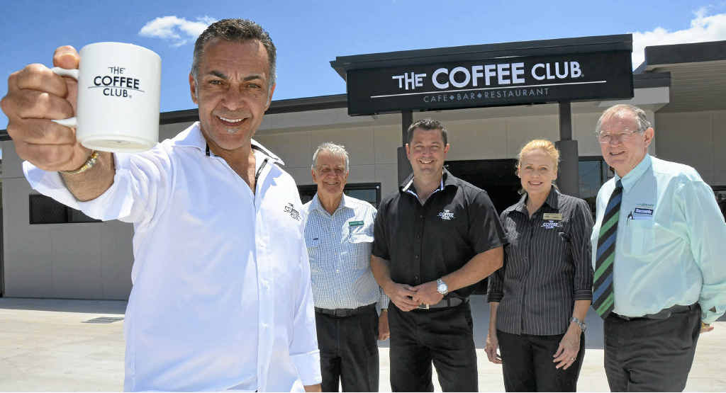 One of The Coffee Club directors John Lazarou, Landmark Harcourts principal Max Holder, franchisees Peter and Lyndall Cook and Landmark Harcourts real estate agent Peter Thew outside the doors of the new Coffee Club. One of The Coffee Club directors John Lazarou, Landmark Harcourts principal Max Holder, franchisees Peter and Lyndall Cook and Landmark Harcourts real estate agent Peter Thew outside the doors of the new Coffee Club.